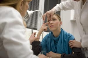 doctors examining a lady